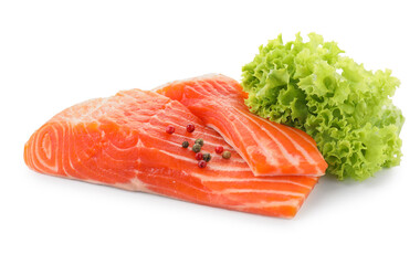 Pieces of fresh salmon, peppercorns and lettuce isolated on white