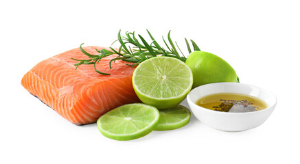 Piece of fresh salmon, lime and spices isolated on white