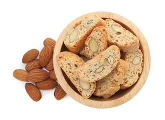 Traditional Italian almond biscuits (Cantucci) in bowl and nuts isolated on white, top view