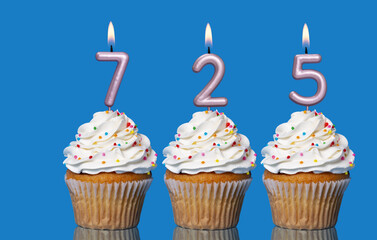 Birthday Cupcakes With Candles Lit Forming The Number 725