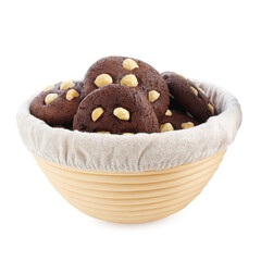 Tasty chocolate cookies with hazelnuts in basket isolated on white