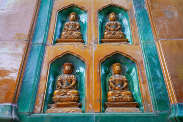 glazed Buddha on the wall of the Wisdom-Sea Temple, The Liangless Buddha Temple at the top of Wanshou Mountain in Summer Palace in Beijing.