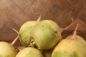 Whole fresh ripe turnips on table, closeup