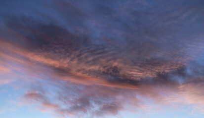 Colorful clouds in the sky at sunset time. Abstract color composition.