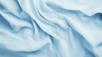 Naklejka premium Soft draped fabric texture in light blue hue displaying gentle folds and subtle variations for textile design inspiration