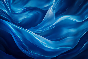 Obraz premium Smooth silk fabric texture in vibrant royal blue, flowing folds and a luminous sheen, soft and elegant