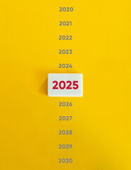 Year 2025 Banner. Text on Block Letter Tile on Yellow Background. Minimal Aesthetic.