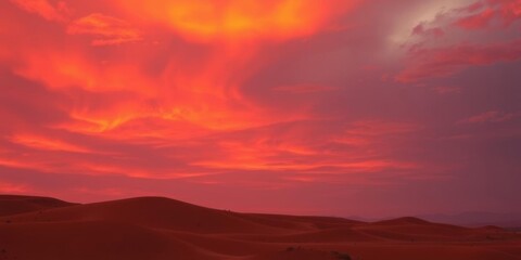 Fiery sunset over a desert landscape with rocky formations and sandy dunes, energetic, sunset