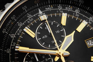 Close-up of the watch dial, black watch envelope, gold pointer, timekeeping, passing, past, new year, countdown to the new year