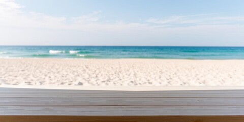 Obraz premium Empty desk with a small potted plant and a window view of the summer beach landscape with sandy shore and blue ocean in the background, calming colors, summer vibes