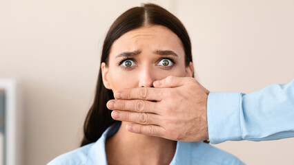 Sexual Harassment At Work. Boss Harassing Scared Employee Girl, Covering Mouth With Hand Making Her...