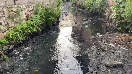 dirty gutters in residential areas. household waste disposal gutters