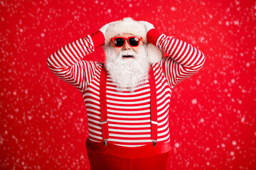 Portrait of his he nice handsome attractive cheerful cheery amazed grey-haired Santa having fun...