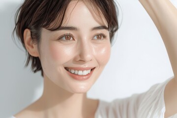 Japanese Woman Smiling and Waving in Skincare Concept Photo