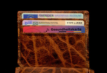 Portemonnaie, Geldbörse, Scheckkarten, Dokumente, Ausländer, Migration, Integration....