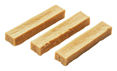 Fototapeta premium Three bars of a sweet, chewy candy are displayed, cut out - stock png.