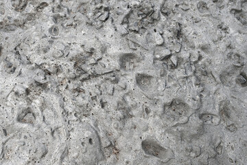 Liquid and dried concrete as a background