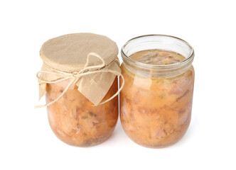 Canned meat in glass jars isolated on white