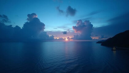 Sky painted in hues of sunset meets the vast ocean