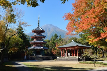 traditional architecture surrounded by autumn foliage with a mountain backdrop