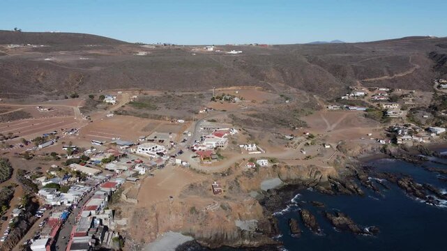 Aerial pulls back from La Bufadora on Baja California coast, Mexico