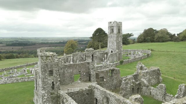 Historic ruins of a 1512 Franciscan monastery with a preserved tower on the Hill of Slane in Ireland