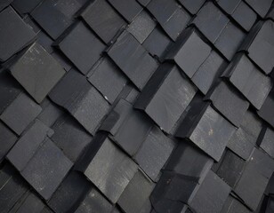 Fototapeta premium Black asphalt roof shingles overlapping in a diagonal pattern, rooftop, vertical, top view