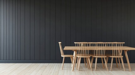 Minimalist dining room with wooden table and chairs against a dark wall.