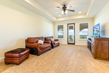 Cozy living room with comfortable leather couches and modern decor