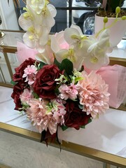 The concept of a bouquet mixed arranged flower. Many various Colorful wedding  flowers, bright and beautiful.