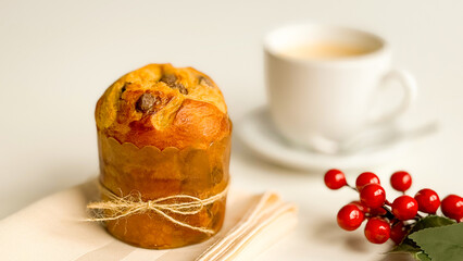 Traditional mini fruit Christmas panettone on the table.v