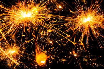Sparkler spark. Firework spark or bengal light sparkler. New Year banner or Christmas background....