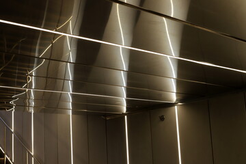 Bright lighting of buildings and structures close-up. Abstract drawings and backgrounds.