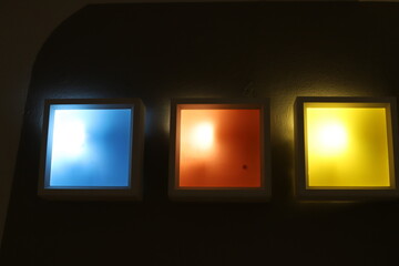Bright lighting of buildings and structures close-up. Abstract drawings and backgrounds.