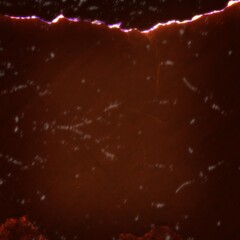 Film texture background with heavy grain, dust and light leakage developed on paper