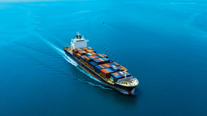 Aerial view of the freight shipping transport system cargo ship container. international...