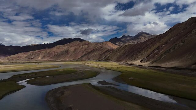 Aerial drone shot of indus river flowing in Ladakh during sunset beautiful scenery