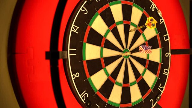 Two dart players aiming at the bulls eye. the one who is next start the game. Bullen