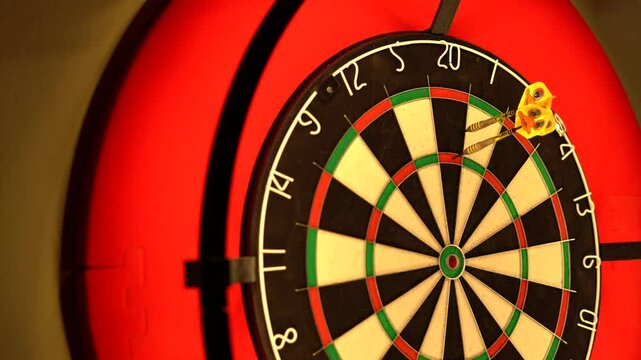 Three darts are thrown onto the dartboard. The first dart hit tripple 20, the second hit 20 and the third hit 20.
Score 100 points