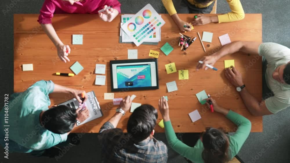 Poster top view of skilled business people working together to design web design. aerial view of designer b
