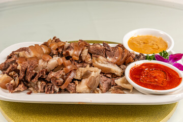 White-cut Dongshan lamb on a plate close-up © Lau