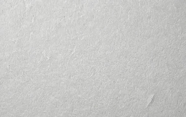 Textured White Surface: A Close-Up Study of Subtle Variations in Light and Shadow