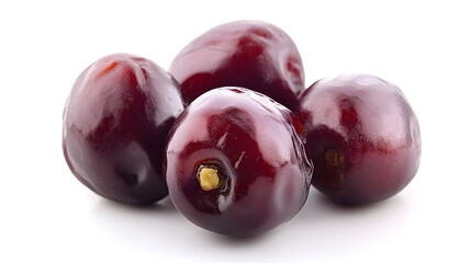 Obraz premium Four glossy, dark red jujube fruits arranged on a white background.
