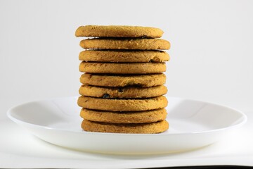 crispy cookies on a plate on a white background
