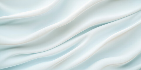 Obraz premium Elegant white silk fabric with flowing waves for luxurious design concepts and textures