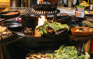 Argentina, San Telmo market restaurants offering parilla grilled meat traditional cuisine .
