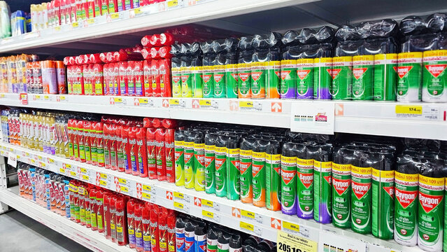 A variety of insect control options multi insect killer odorless aeresol spray. Insect repellent, Mosquito repellent spray, Fly spray, Roach trap products on shelf. Thailand, November 28, 2024