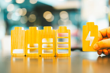 Battery charge indicator wood model. Phone charge level. Concepts of battery charge indicators through mesmerizing photographs. Unleash the power, technology, and innovation of these digital icons.