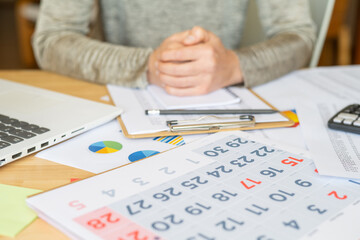 Professional Workspace With Calendar, Charts, And Laptop, Highlighting Time Management, Task Planning, Financial Organization, Productivity,Scheduling And Strategic Goals For Business Or Personal Use 