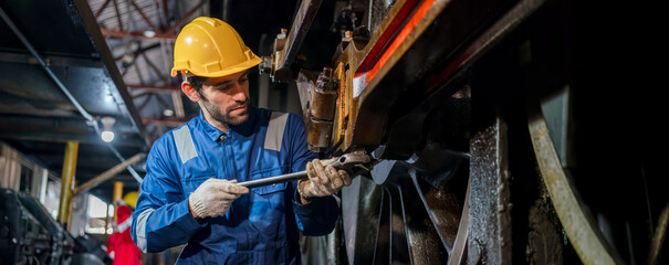 Engineer checking construction process railway and checking work on railroad station . Railway engineer checking machines in train station. Train engineer concept